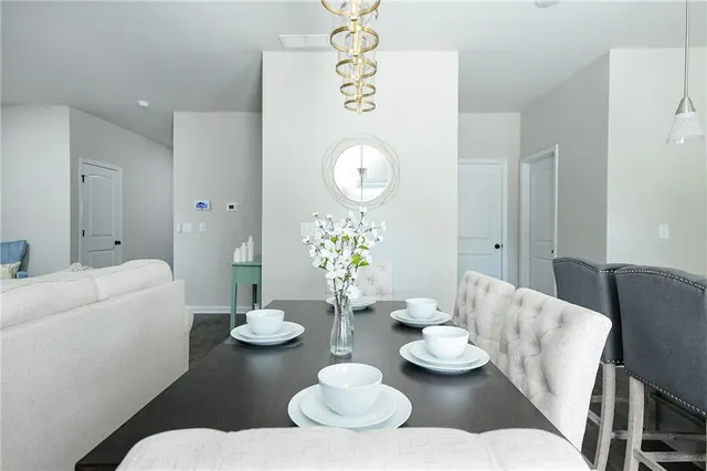 a view of a dining room with furniture