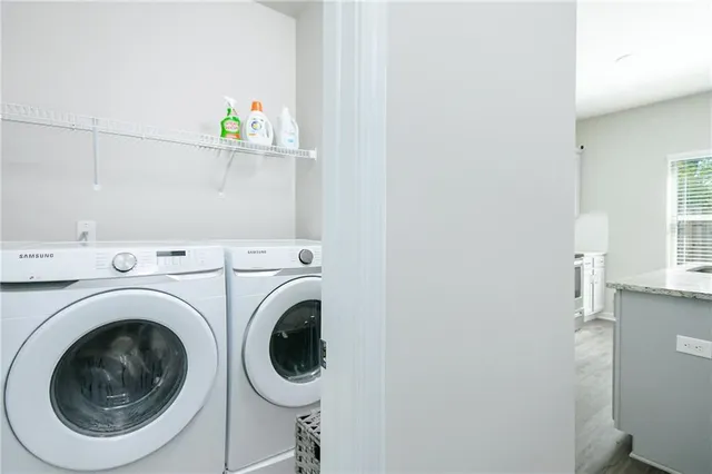 a utility room with dryer and washer