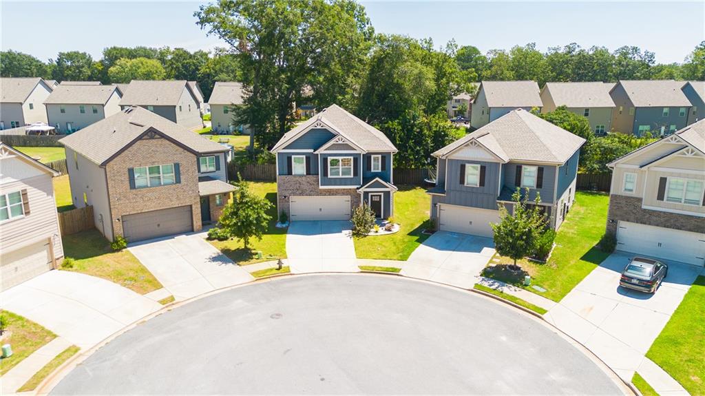 2288 Elsie Way Hampton, GA 30228 - Photo 3 of 45 a view of a house with a patio and a view of a house