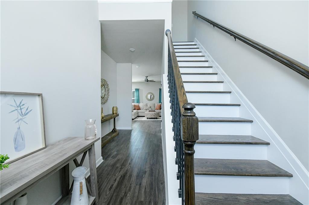 2288 Elsie Way Hampton, GA 30228 - Photo 4 of 45 a view of entryway and hall with wooden floor