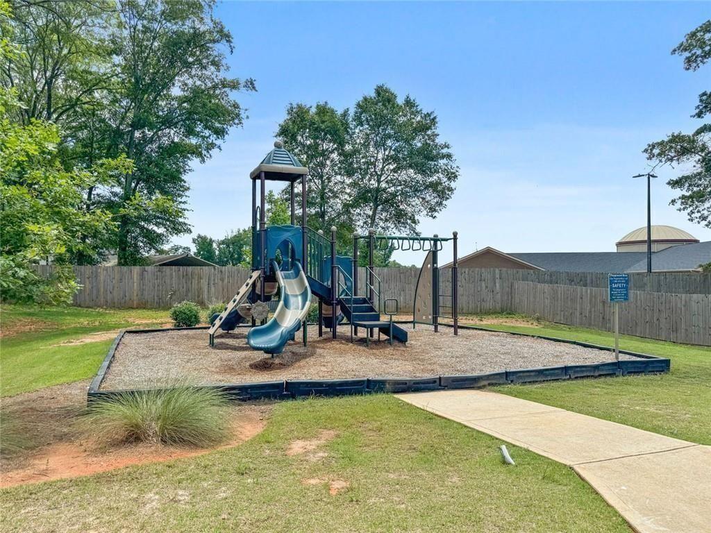 2288 Elsie Way Hampton, GA 30228 - Photo 43 of 45 a view of a park with slide