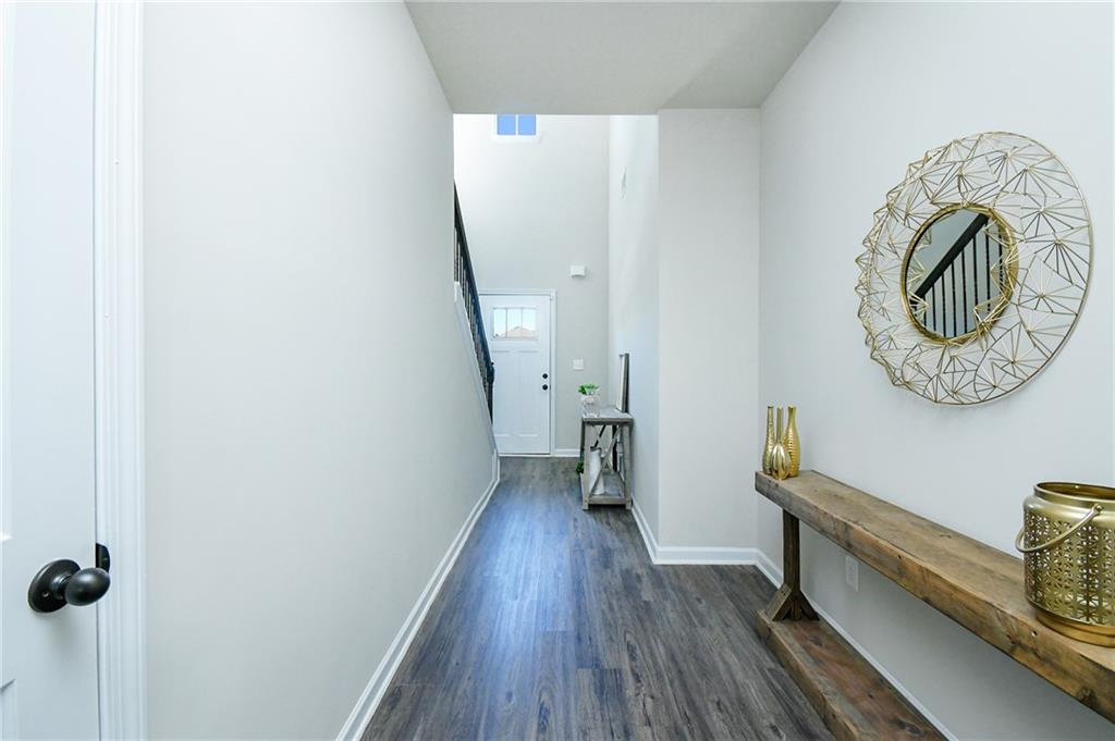 2288 Elsie Way Hampton, GA 30228 - Photo 6 of 45 wooden floor in a gallery