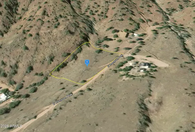 a aerial view of a backyard of a house