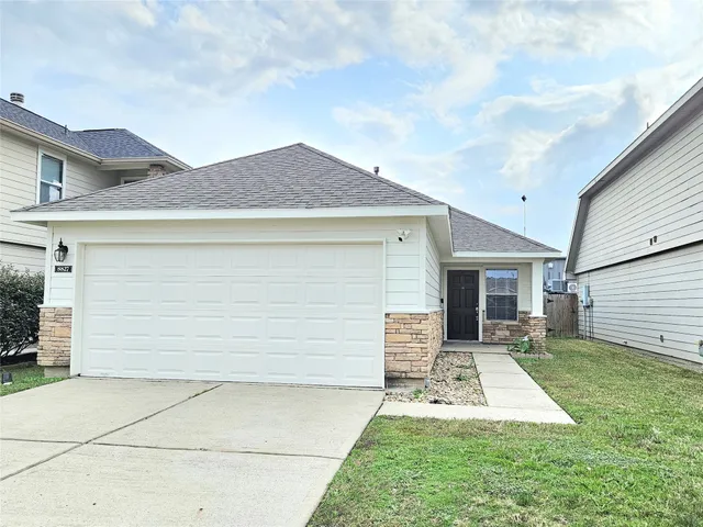 a front view of house with yard