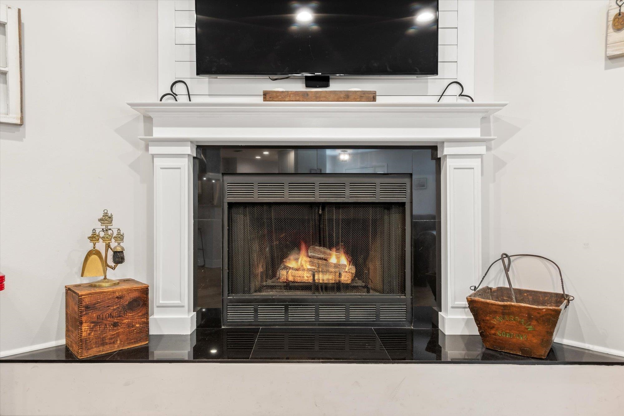 200 Raintree Trail St. Augustine, FL 32086 - Photo 21 of 36 a living room with furniture and a fireplace