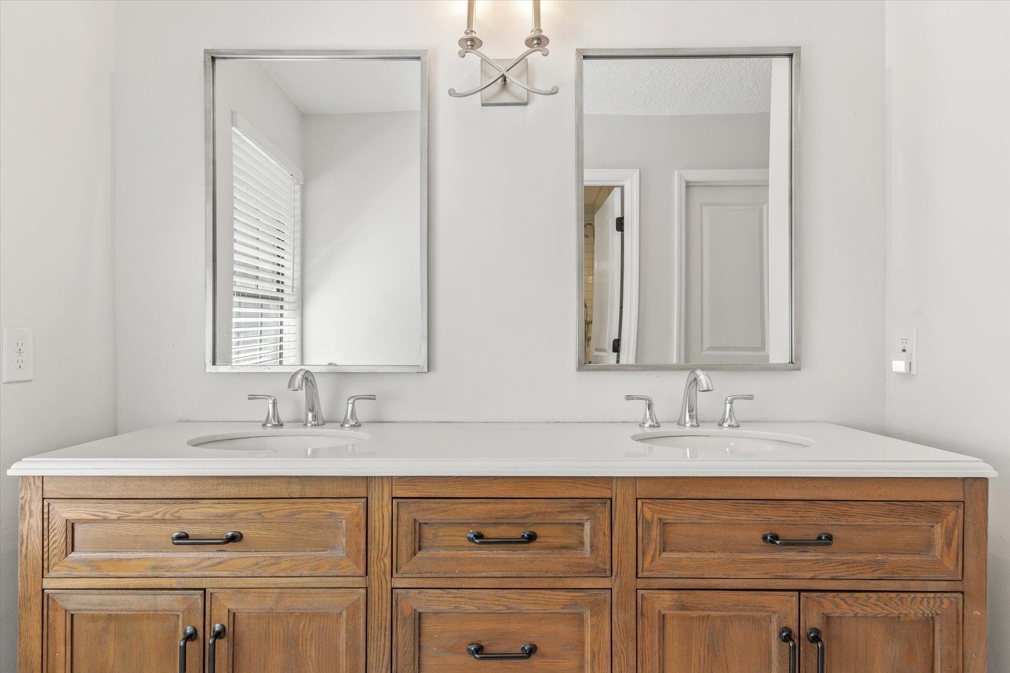 200 Raintree Trail St. Augustine, FL 32086 - Photo 25 of 36 a bathroom with a sink double vanity and a mirror