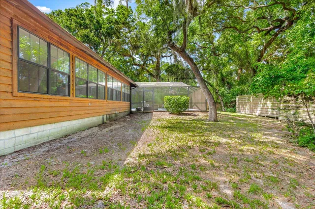 a view of backyard with green space