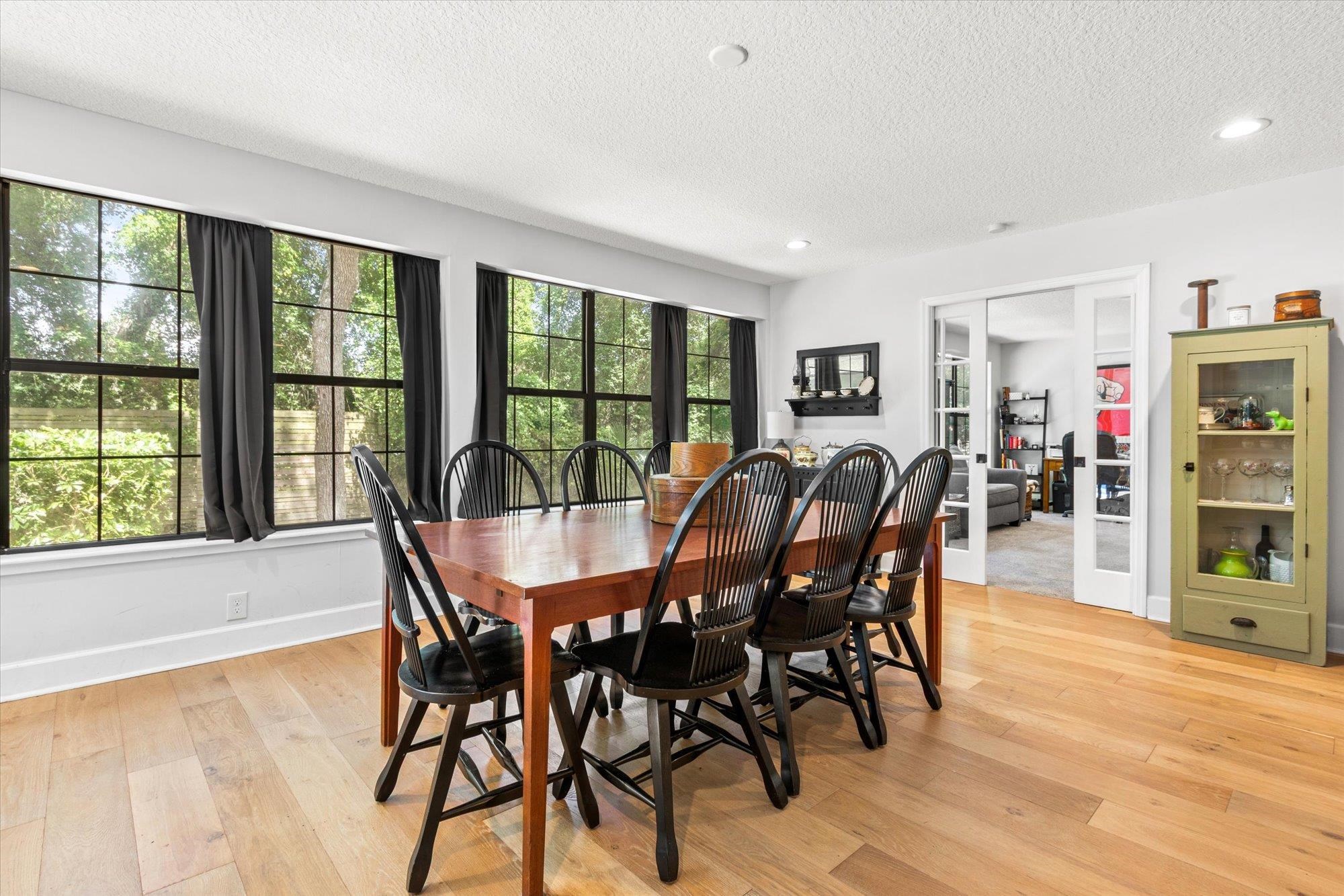 200 Raintree Trail St. Augustine, FL 32086 - Photo 6 of 36 a view of a dining room with furniture window and wooden floor