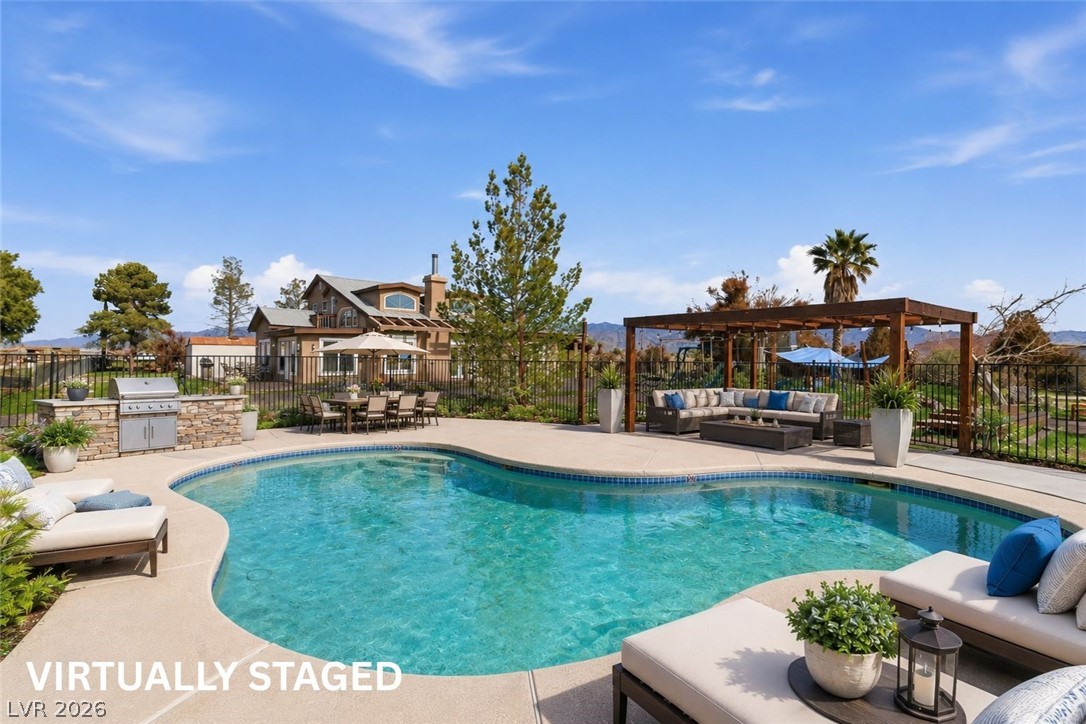2570 East Kellogg Road Pahrump, NV 89048 - Photo 49 of 60 Virtually staged in-ground, fully-fenced pool