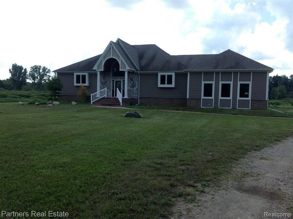 6817 West Lange Road Fowlerville, MI 48836 - Photo 1 of 21 Front View