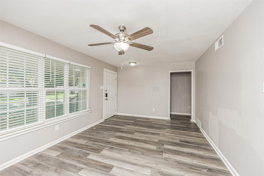 2155 Gaylord Drive Dallas, TX 75227 - Photo 8 of 21 a view of an empty room with a window