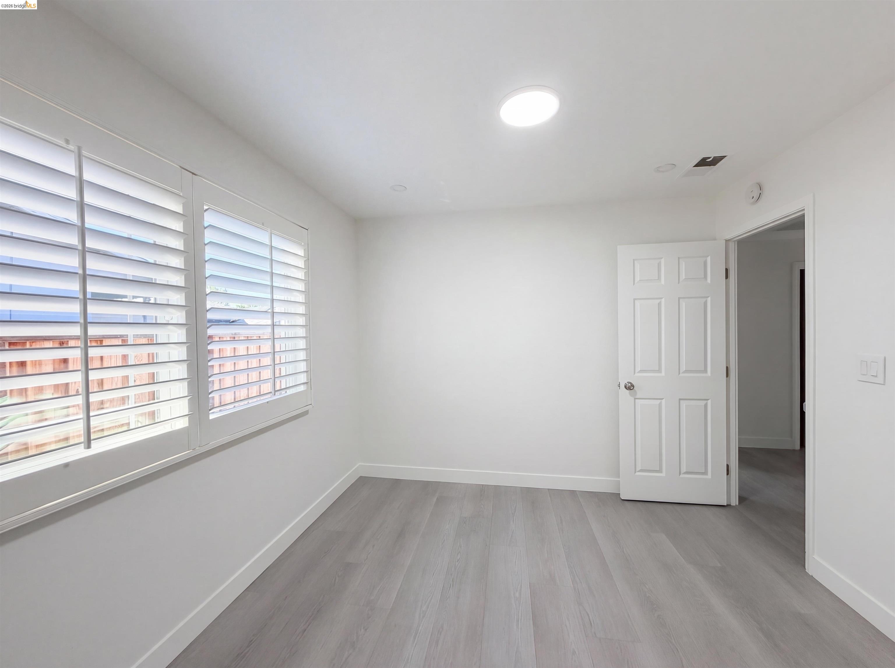 1564 South Wolfe Road Sunnyvale, CA 94087 - Photo 11 of 27 Spare room with light wood finished floors and baseboards
