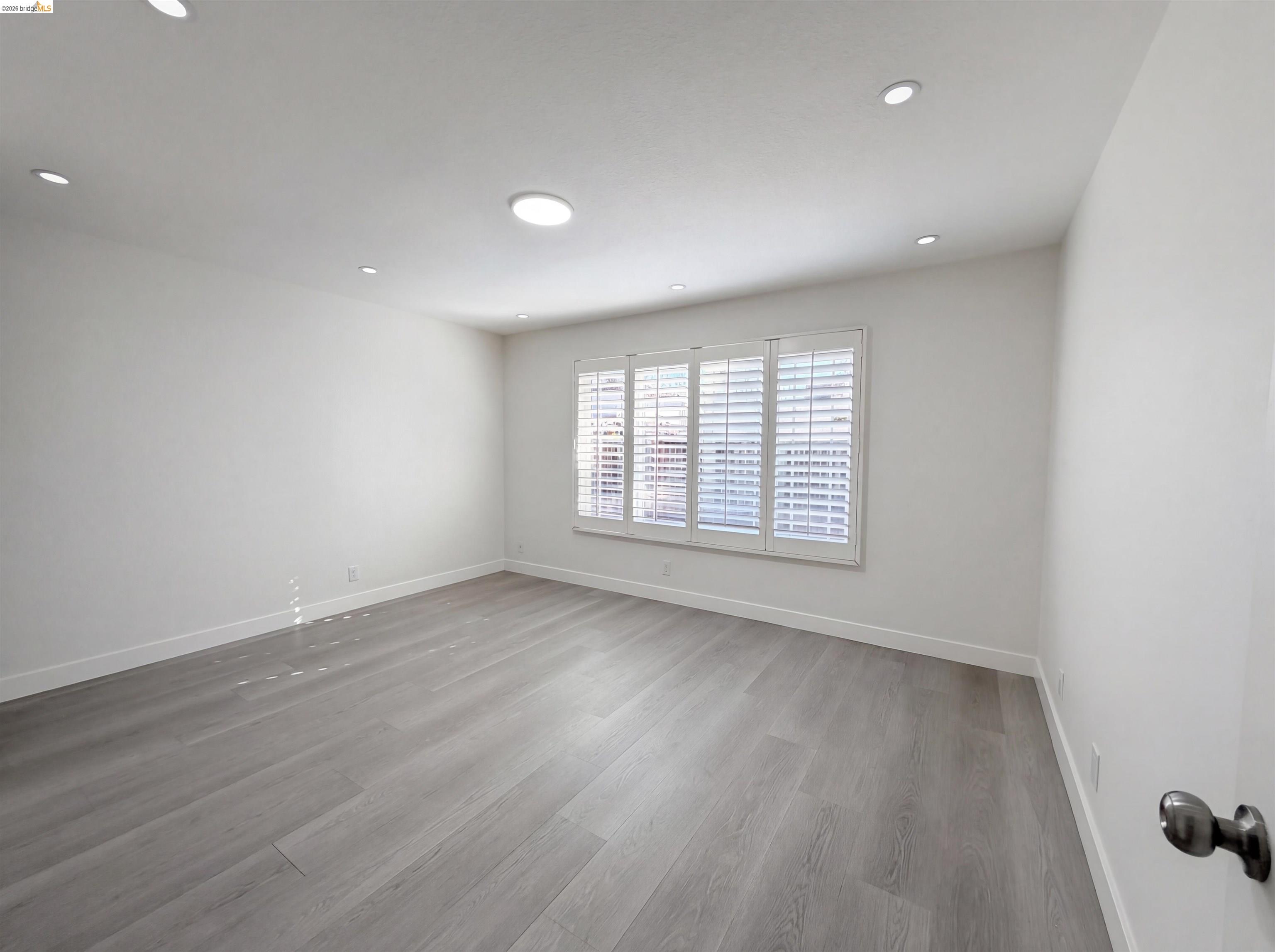 1564 South Wolfe Road Sunnyvale, CA 94087 - Photo 3 of 27 Unfurnished room featuring light wood-style flooring and recessed lighting