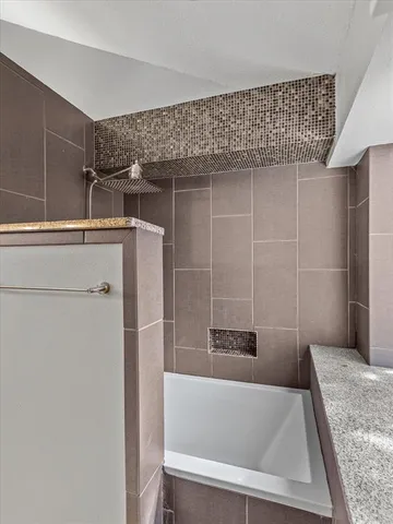 a bathroom with a bathtub