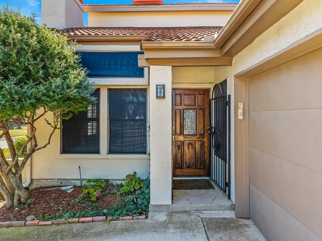 a view of a entryway door front of house