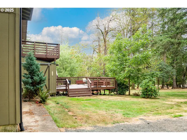 a view of a yard with furniture