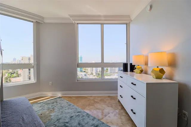 a bed room with a bed and a window