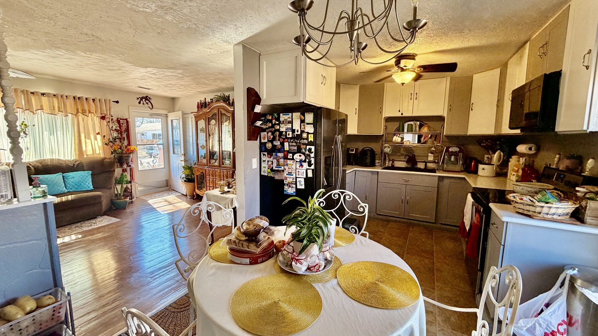 1516 Ruth Ann Drive Centralia, IL 62801 - Photo 4 of 9 a view of a dining room with furniture and a chandelier