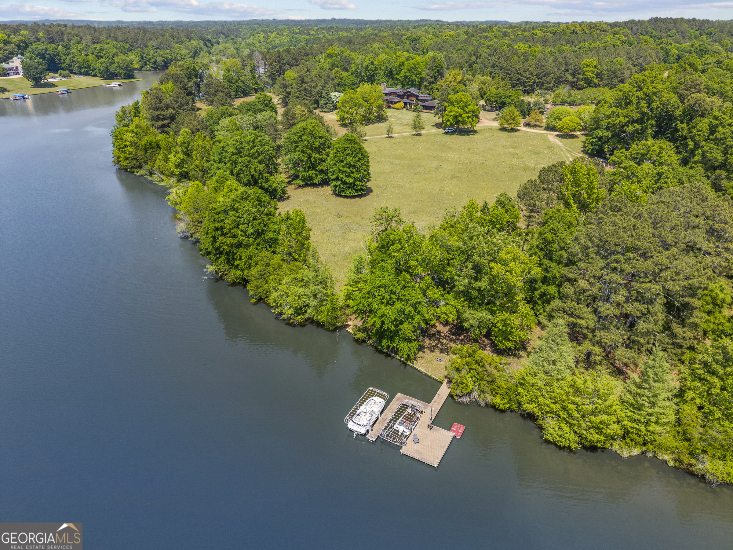 1875 Reids Ferry Road Buckhead, GA 30625 - Photo 12 of 125 an aerial view of a houses with a lake view