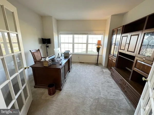 a room with furniture and a window
