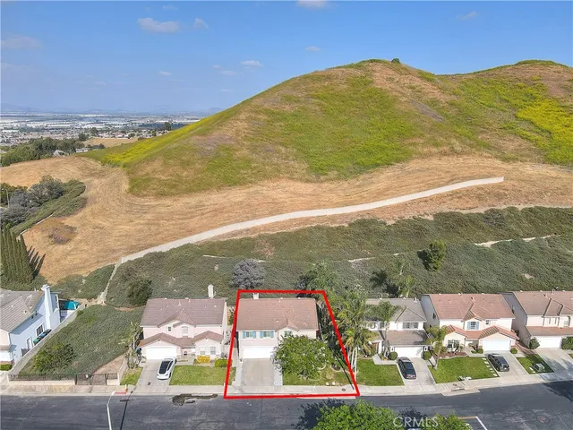 a view of an ocean and a mountain