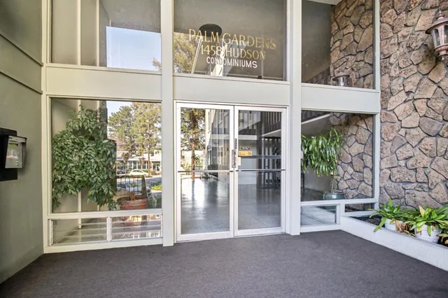 a view of a room with a large window