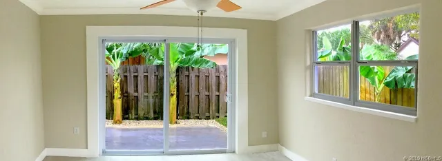 a bathroom with a toilet sink and shower