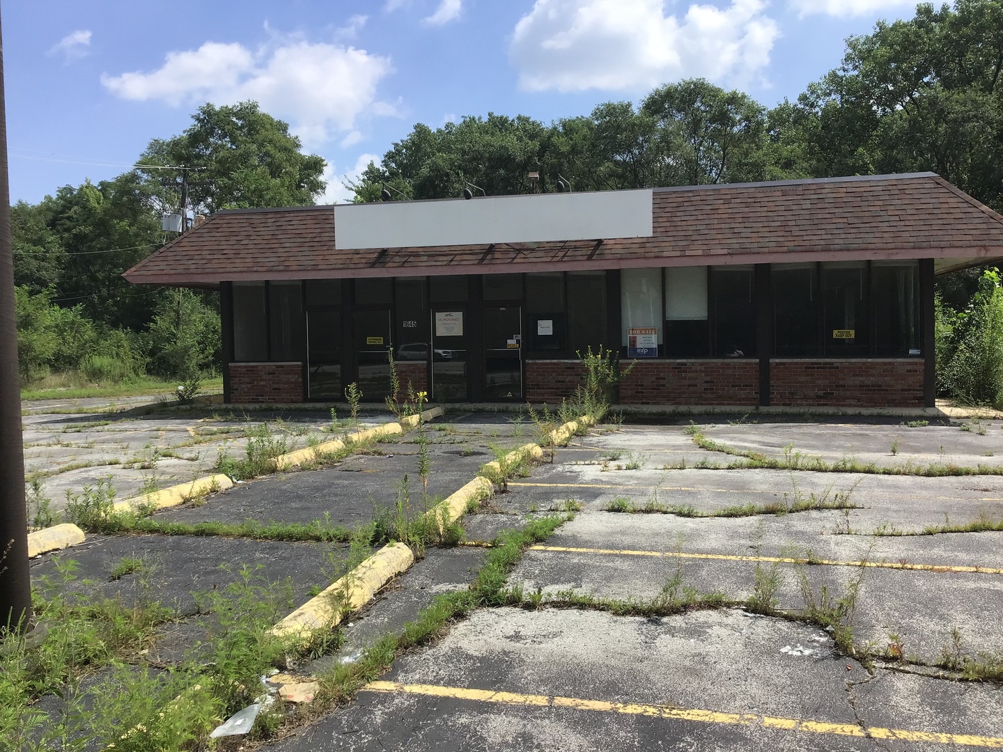 1645 Western Avenue Chicago Heights, IL 60411 - Photo 2 of 20 a front view of a house with a yard