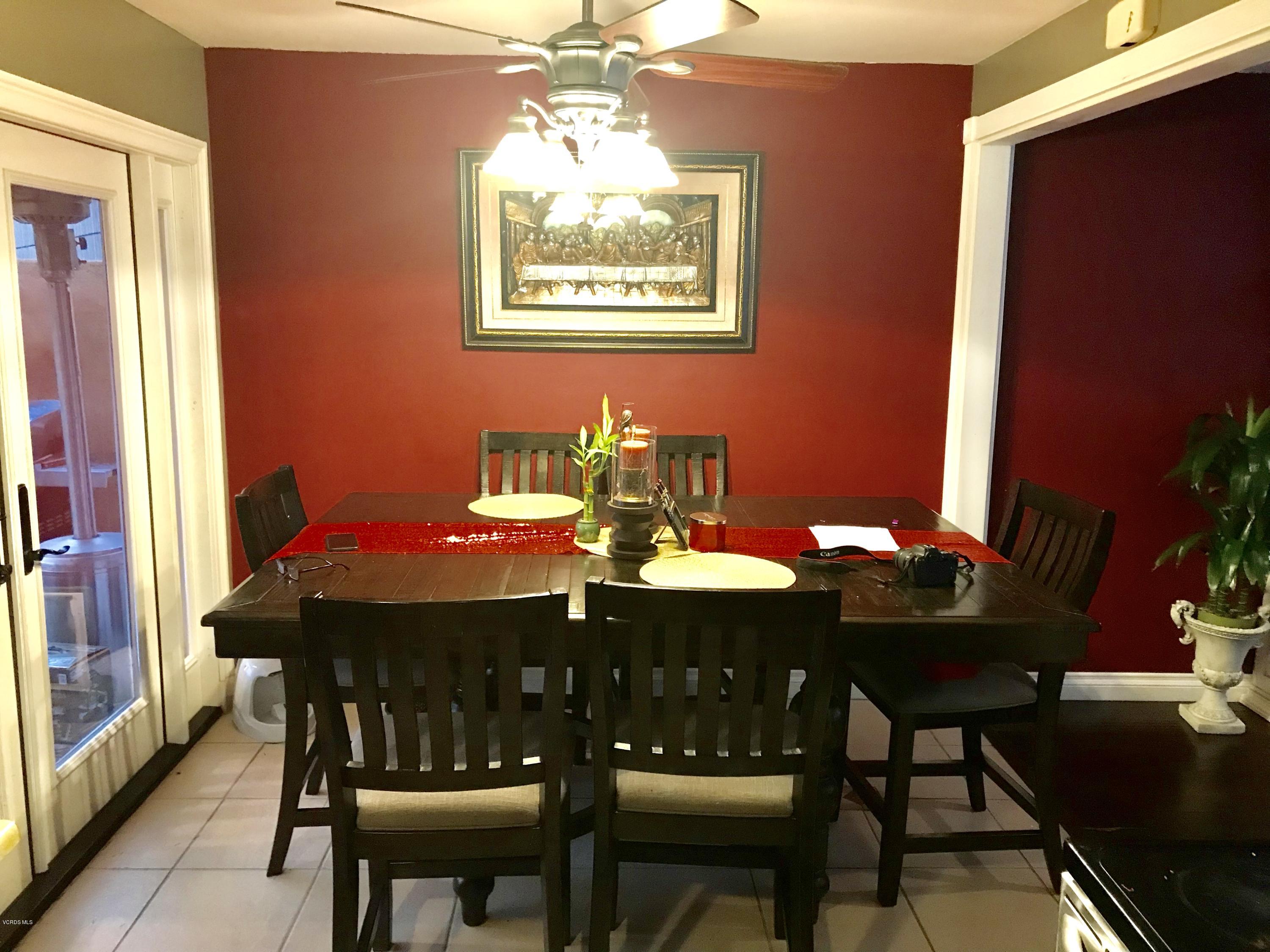 4010 South J Street Oxnard, CA 93033 - Photo 17 of 18 a dining room with a table and chairs
