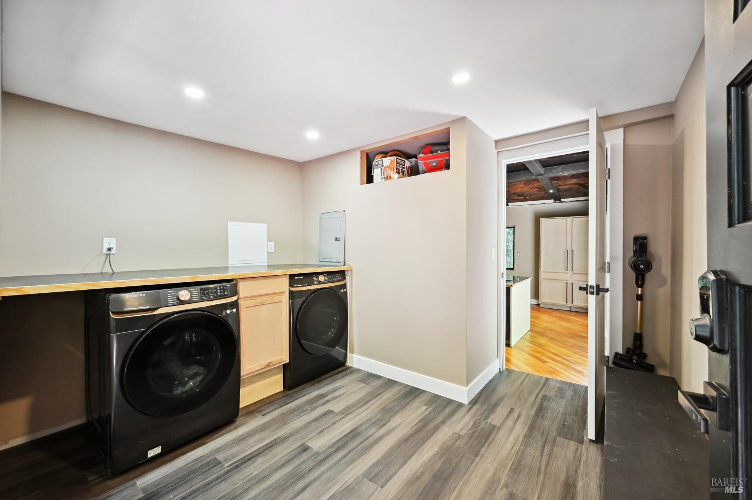 21713 Starrett Hill Drive Monte Rio, CA 95462 - Photo 7 of 50 a view of a hallway with washer and dryer