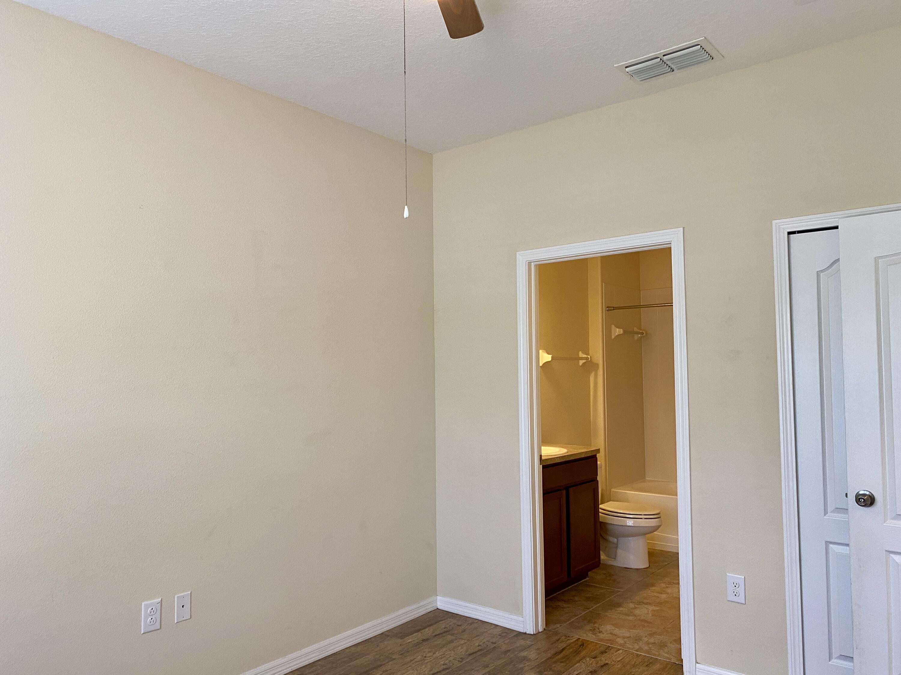 3490 Funston Circle Melbourne, FL 32940 - Photo 18 of 25 a view of a hallway with bathroom