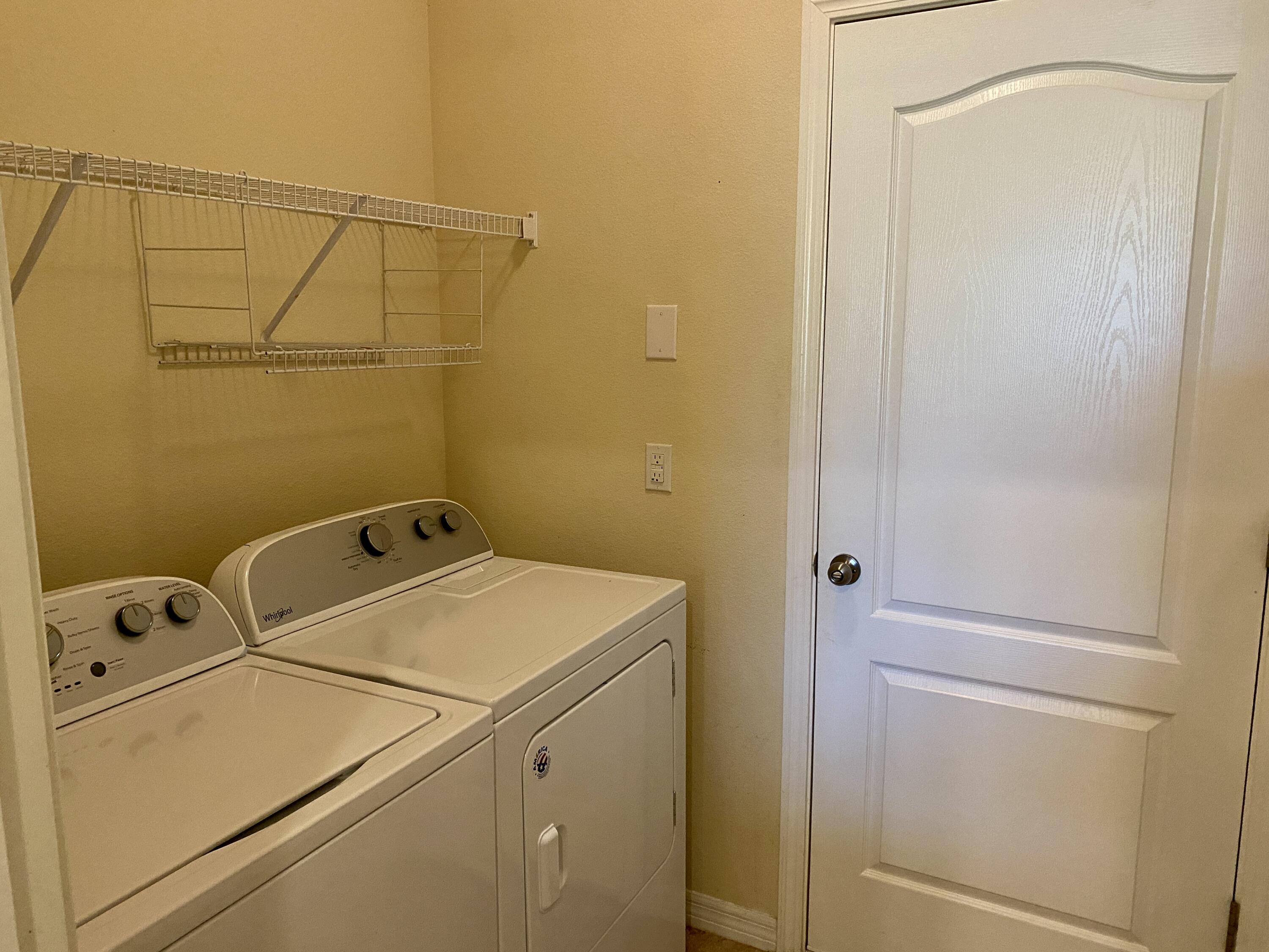 3490 Funston Circle Melbourne, FL 32940 - Photo 22 of 25 a utility room with dryer and washer