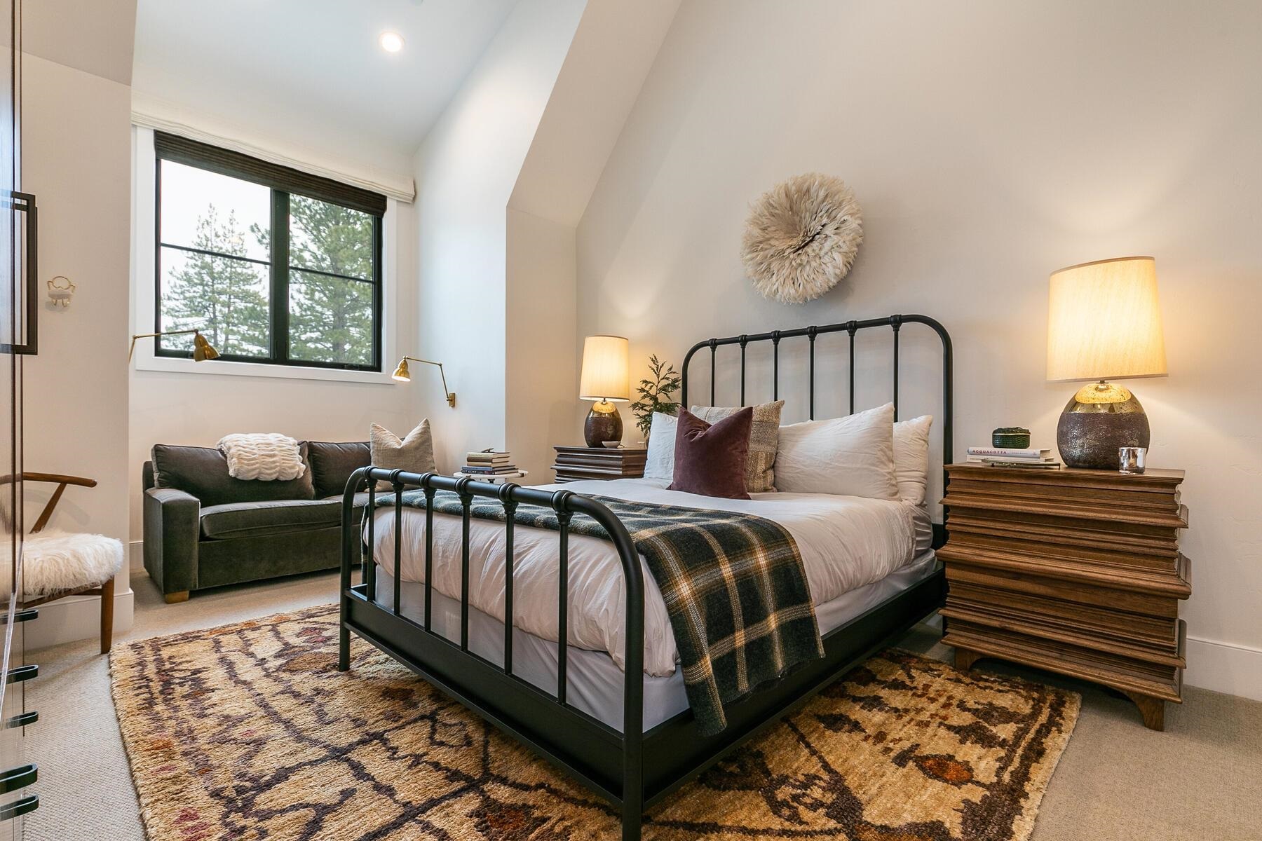 9340 Heartwood Drive Truckee, CA 96161 - Photo 15 of 21 a bed room with a bed and a couch