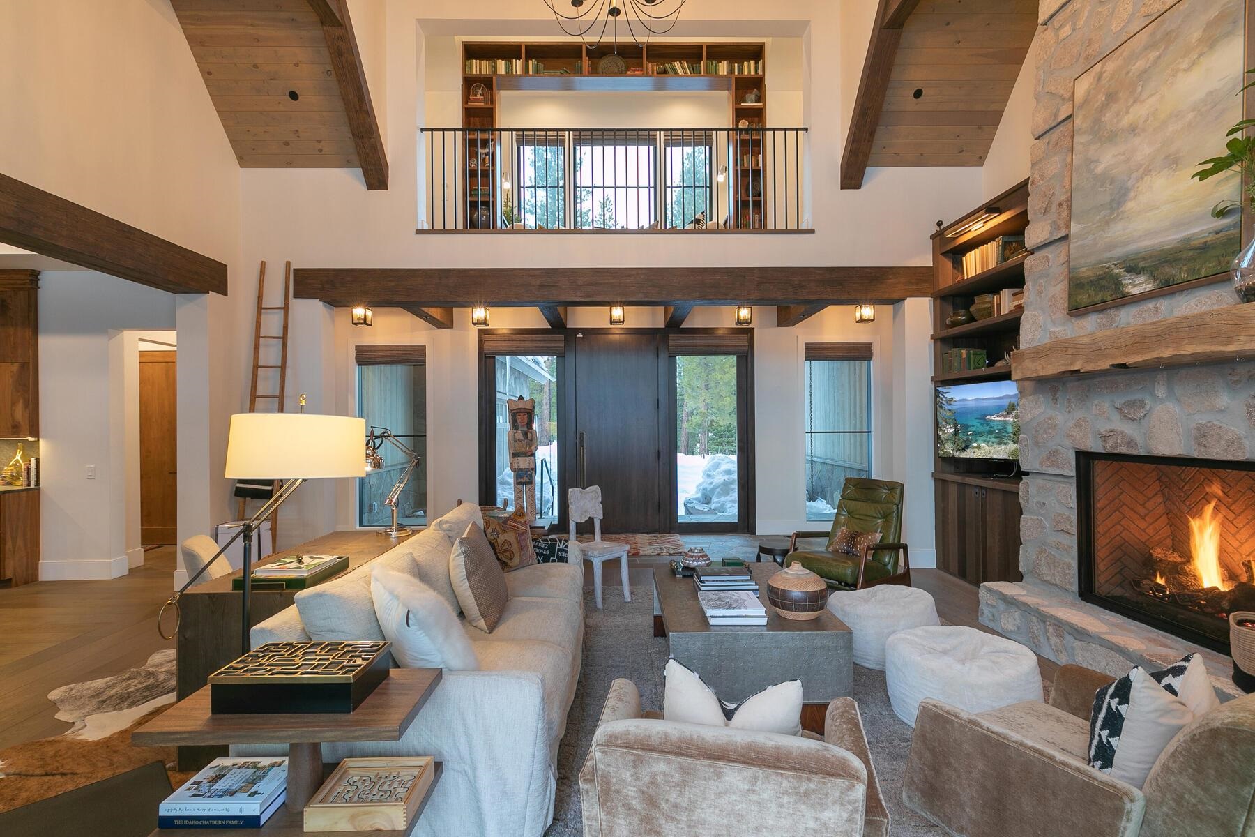 9340 Heartwood Drive Truckee, CA 96161 - Photo 2 of 21 a living room with furniture and a fireplace