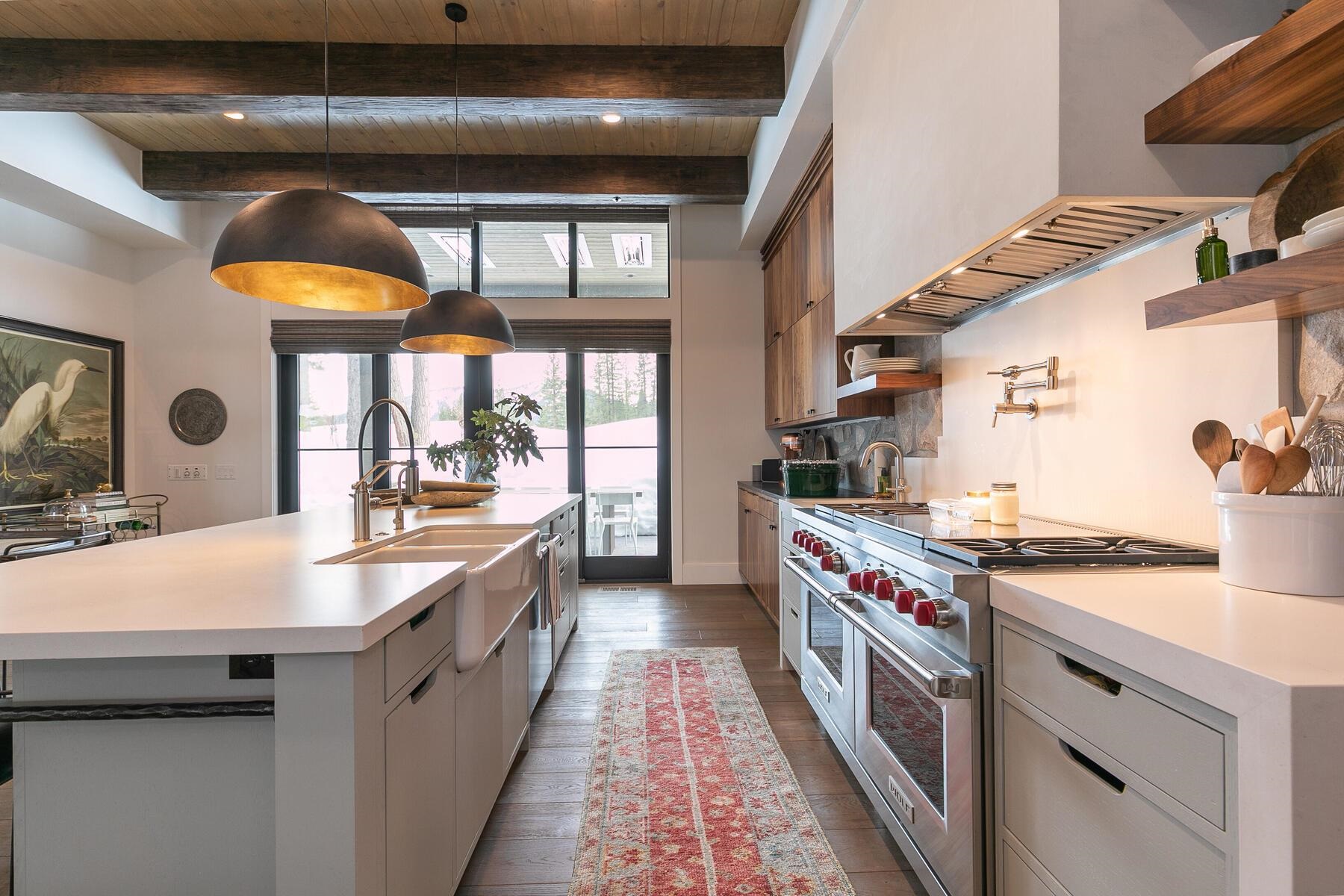 9340 Heartwood Drive Truckee, CA 96161 - Photo 4 of 21 a kitchen with stainless steel appliances granite countertop a sink and a stove