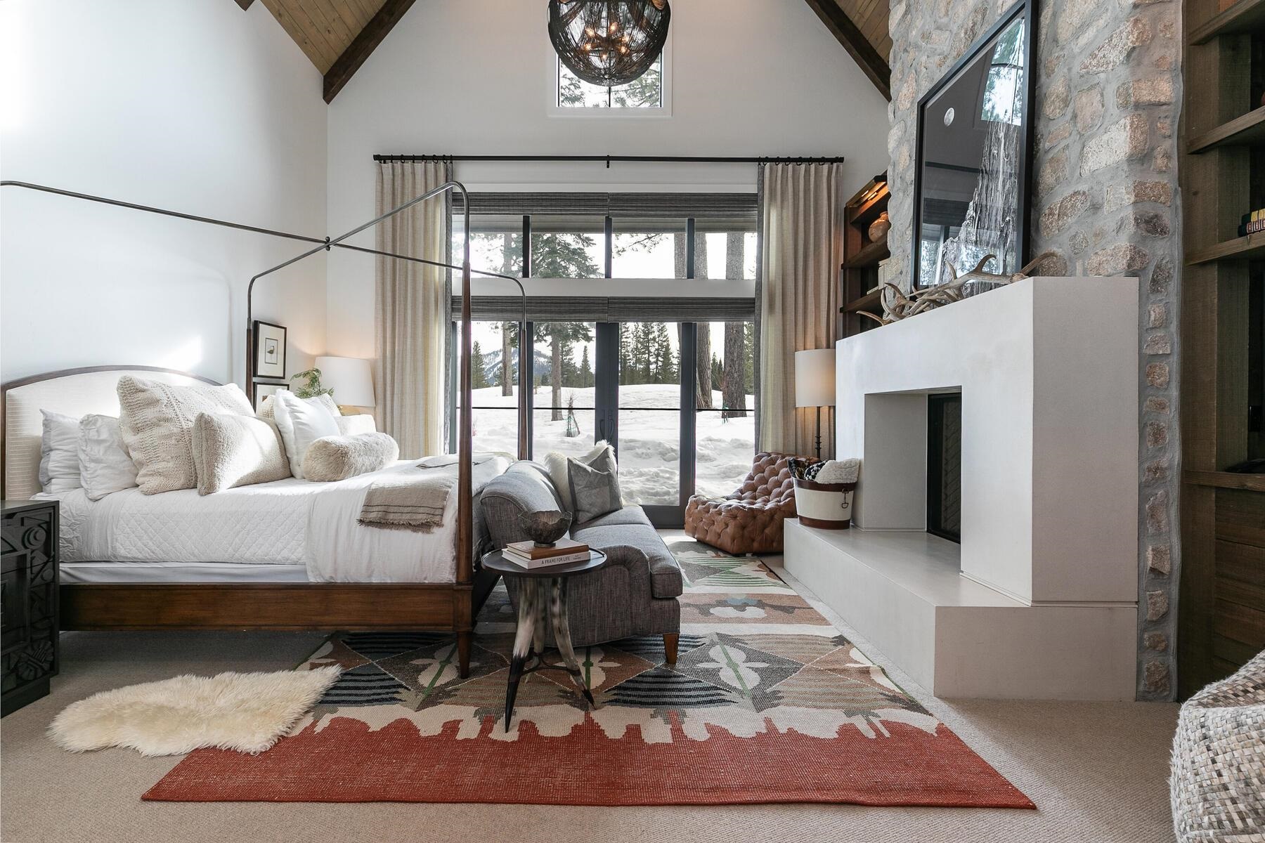 9340 Heartwood Drive Truckee, CA 96161 - Photo 7 of 21 a living room with furniture a rug and a fireplace