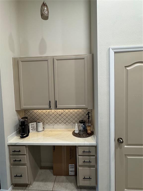 2318 Tanbark Ridge Place, Unit 2318 Plant City, FL 33563 - Photo 20 of 64 a bathroom with a sink and a mirror