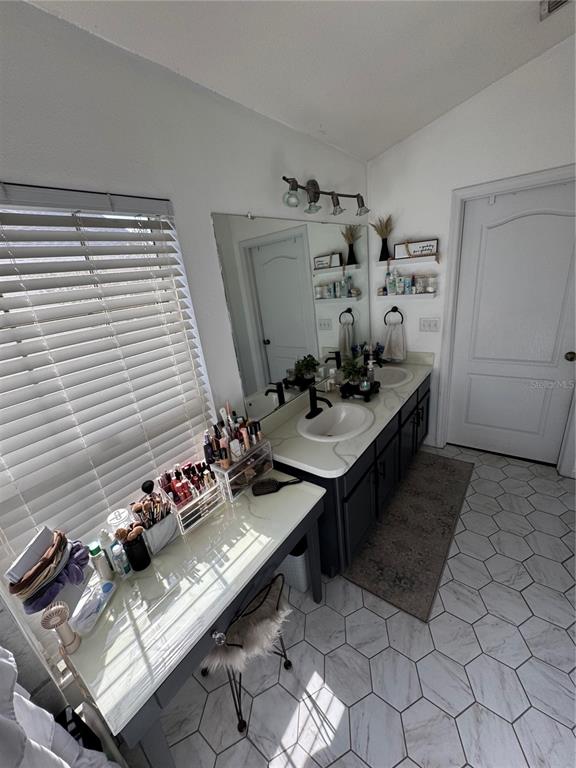 2318 Tanbark Ridge Place, Unit 2318 Plant City, FL 33563 - Photo 37 of 64 a view of a dining table and chairs in a room