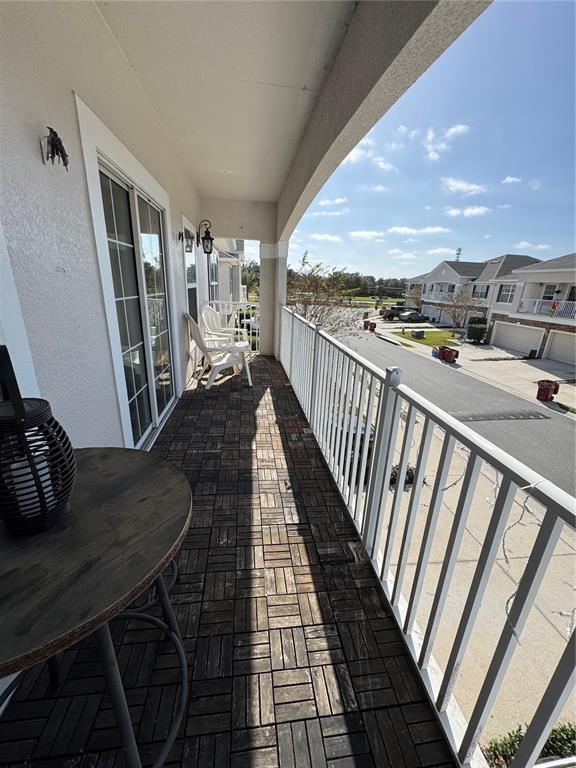 2318 Tanbark Ridge Place, Unit 2318 Plant City, FL 33563 - Photo 64 of 64 a view of a balcony dining area