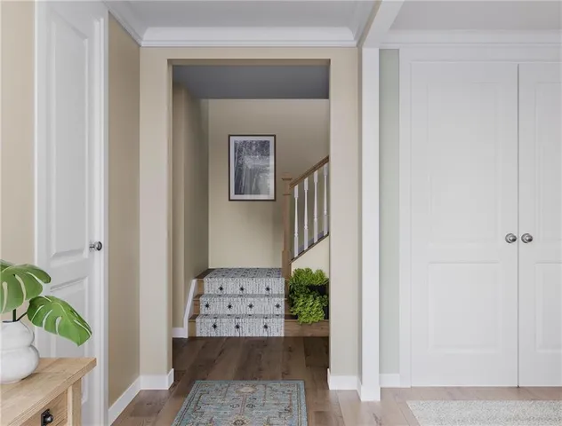 a bedroom with a bed a table and chair