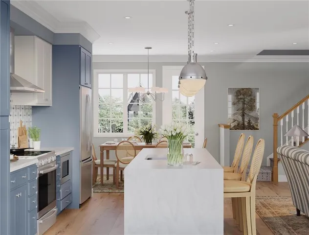 a dining room with furniture a chandelier and wooden floor