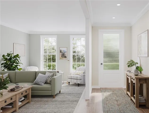 a living room with furniture and a table