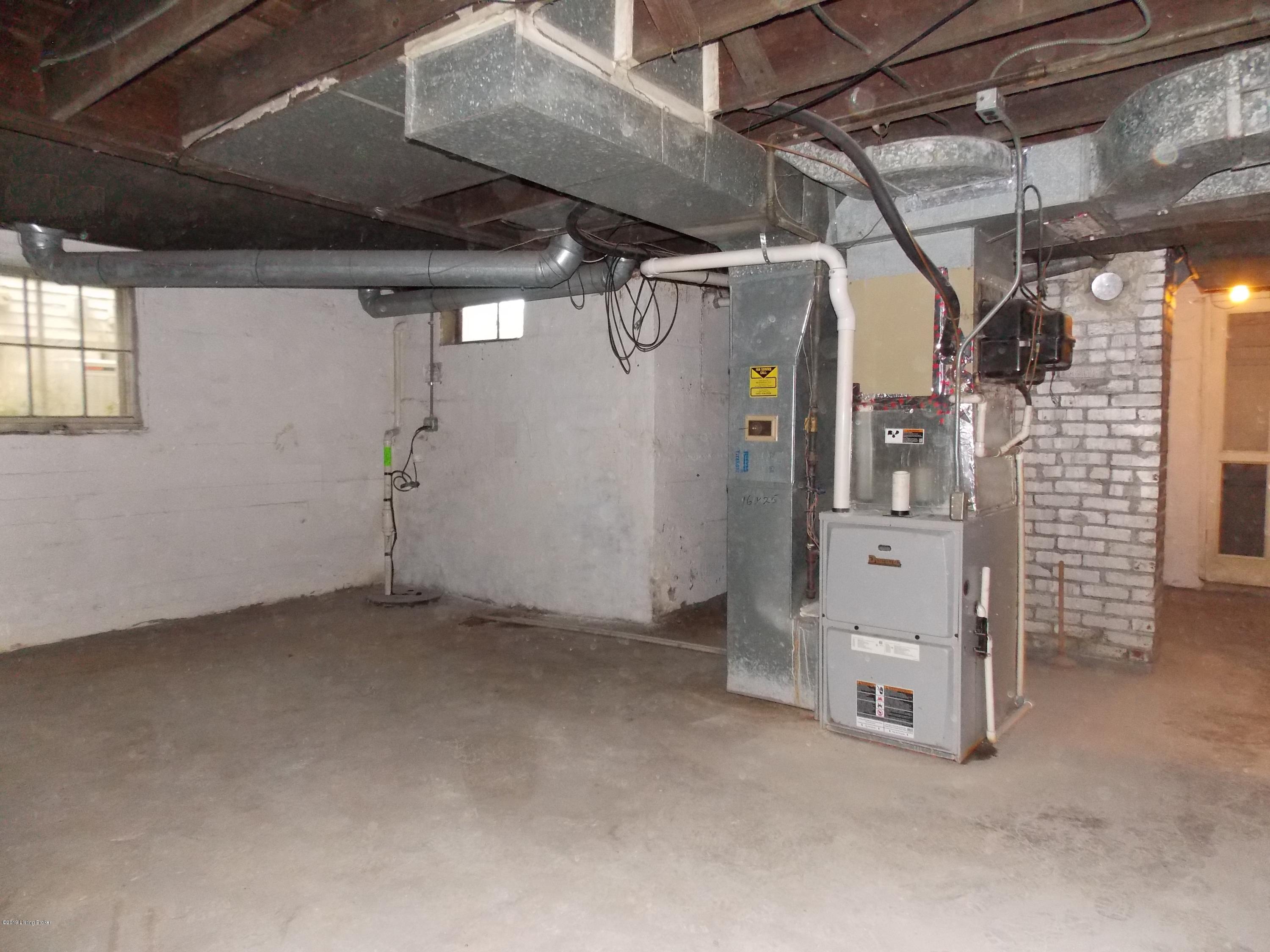 3021 Lexington Road Louisville, KY 40206 - Photo 46 of 53 44-basement storage sweep toward stairs