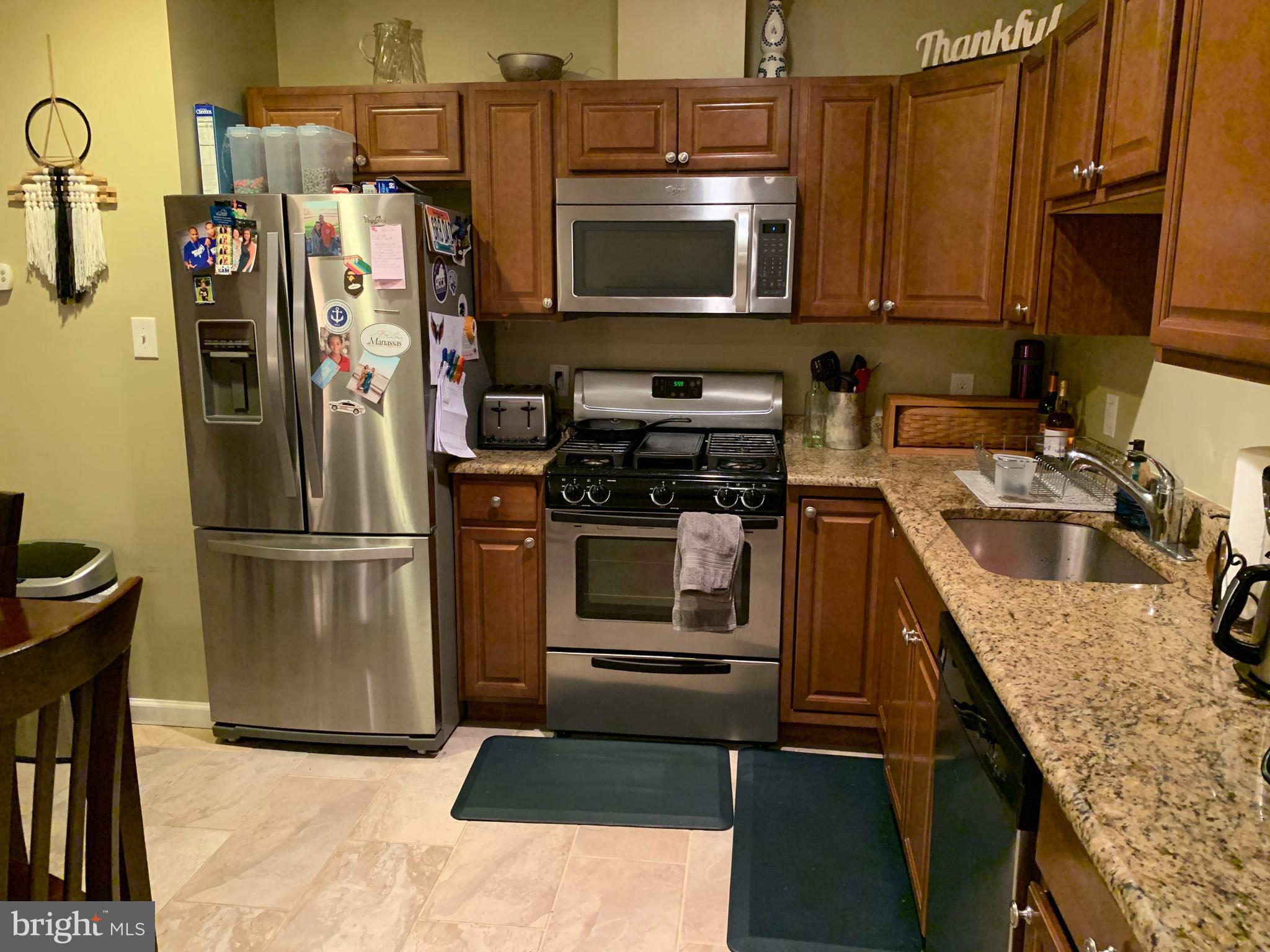 9121 Center Street, Unit C Manassas, VA 20110 - Photo 5 of 26 Kitchen w stainless appls & granite
