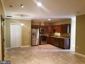 9121 Center Street, Unit C Manassas, VA 20110 - Photo 6 of 26 Vacant kitchen & living room