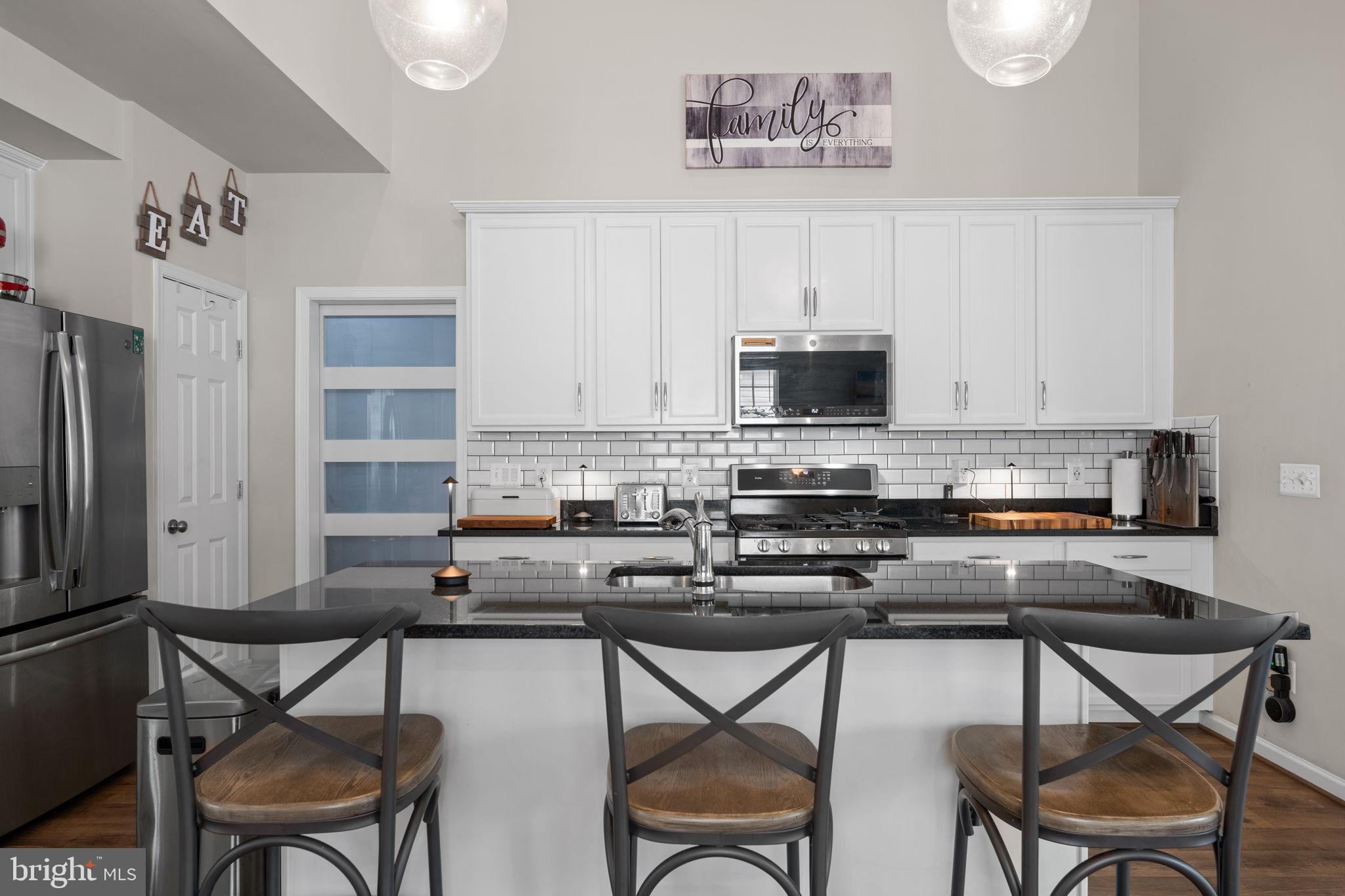 12203 Aster Road Bristow, VA 20136 - Photo 12 of 55 Modern kitchen with sleek finishes.