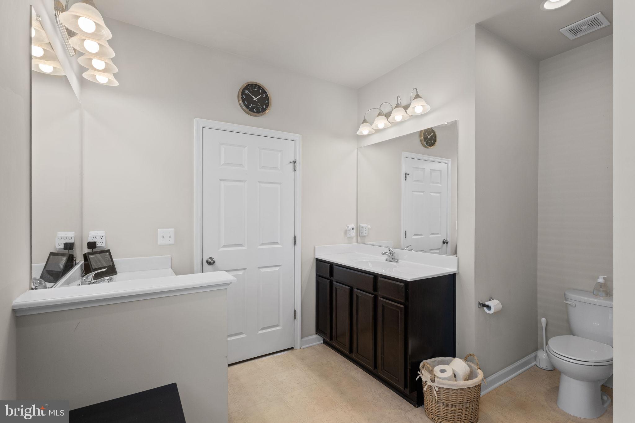 12203 Aster Road Bristow, VA 20136 - Photo 22 of 55 Master bathroom with sleek finishes.