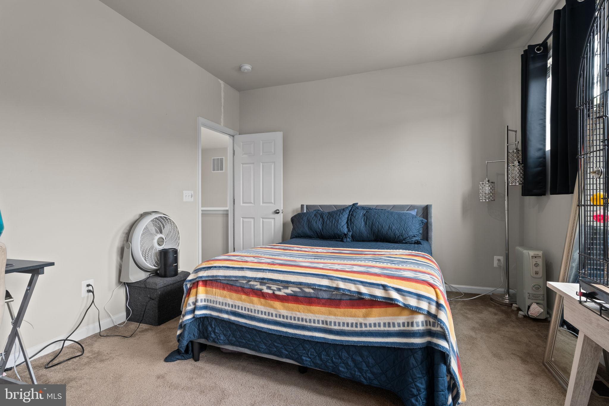 12203 Aster Road Bristow, VA 20136 - Photo 37 of 55 Cozy bedroom with inviting color palette.
