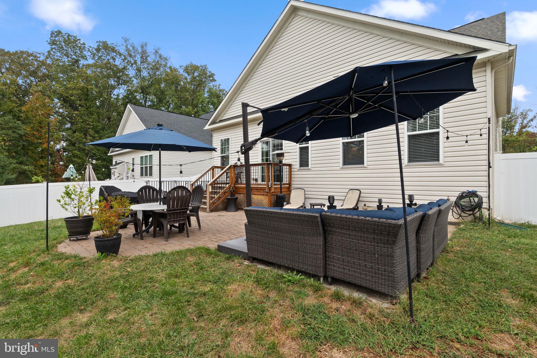 12203 Aster Road Bristow, VA 20136 - Photo 39 of 55 Charming backyard oasis with shaded seating.