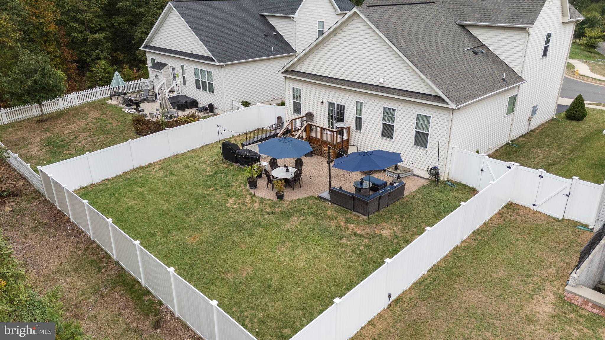 12203 Aster Road Bristow, VA 20136 - Photo 42 of 55 Spacious backyard oasis with cozy seating.
